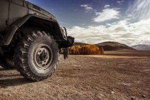 Truck Car Wheel On Offroad Steppe Adventure Trail